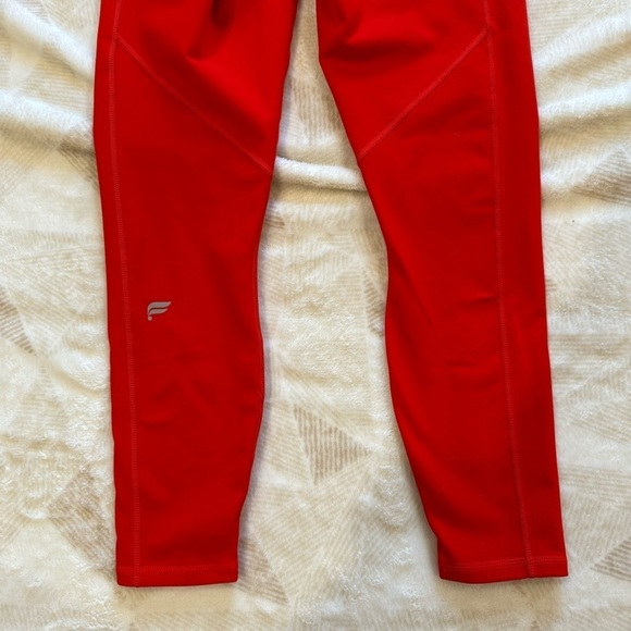Fabletics Cardinal Red Stretch Define Powerhold High Waisted 7/8 Ankle Leggings - Picture 3 of 13